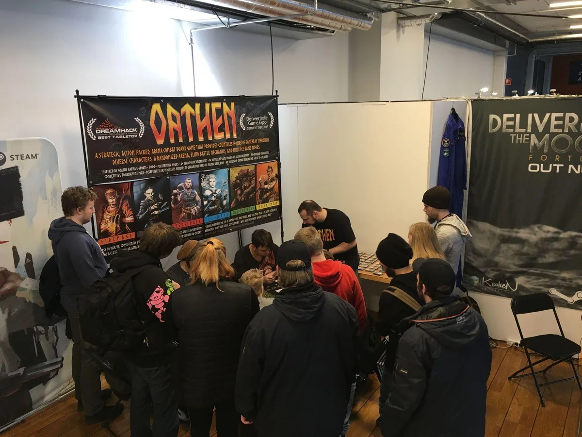 A crowd at the Oathen booth