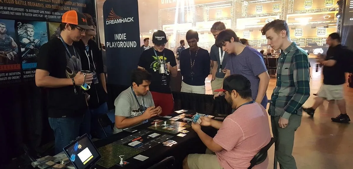 Players at an Oathen event table