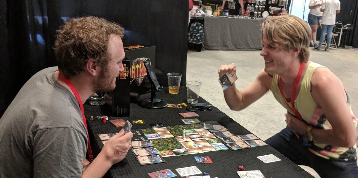 Two players mid-match at an Oathen table